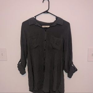 Women’s grey button-up blouse